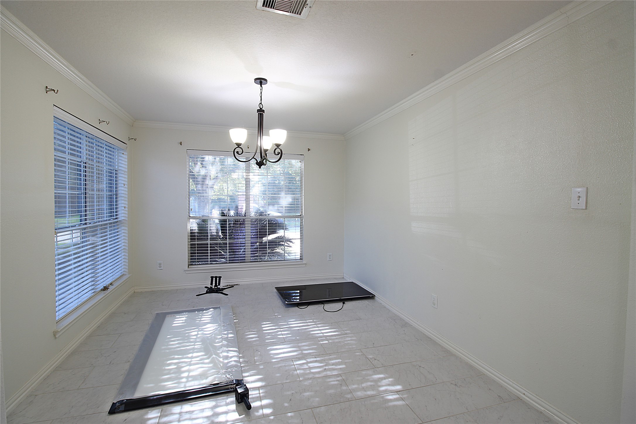 8314 Silver Fir Lane Baytown, TX 77523 - Photo 4 of 22 a view of a room with windows
