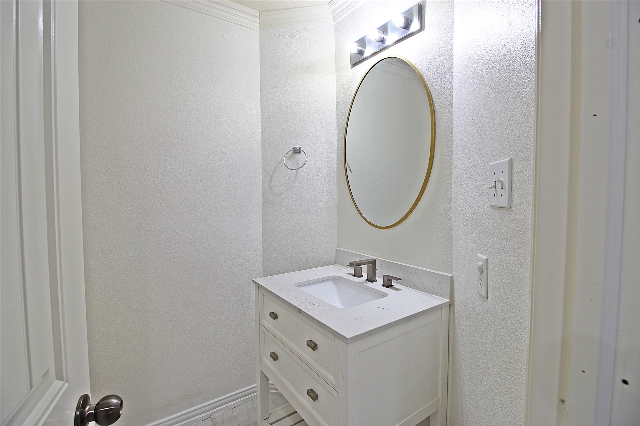 8314 Silver Fir Lane Baytown, TX 77523 - Photo 10 of 22 a bathroom with a sink and a mirror