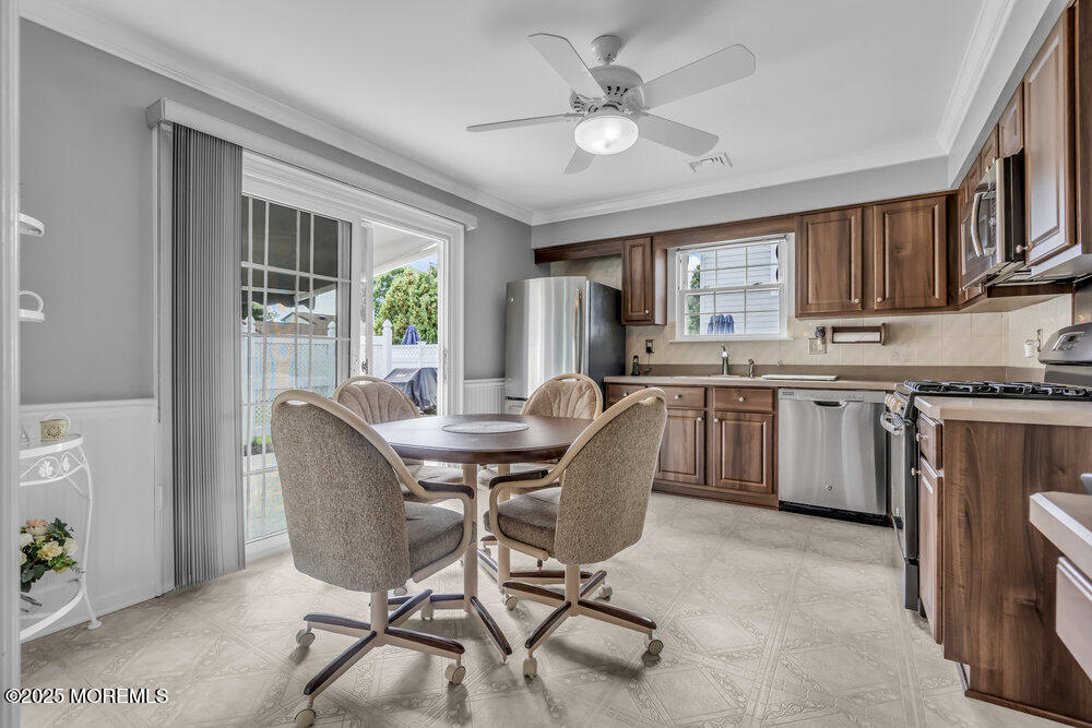 15 Rita Drive Howell, NJ 07731 - Photo 13 of 26 a view of a dining room with furniture window and outside view