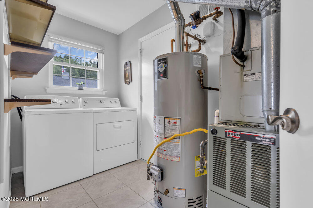 15 Rita Drive Howell, NJ 07731 - Photo 16 of 26 a bathroom with a granite countertop sink and a mirror