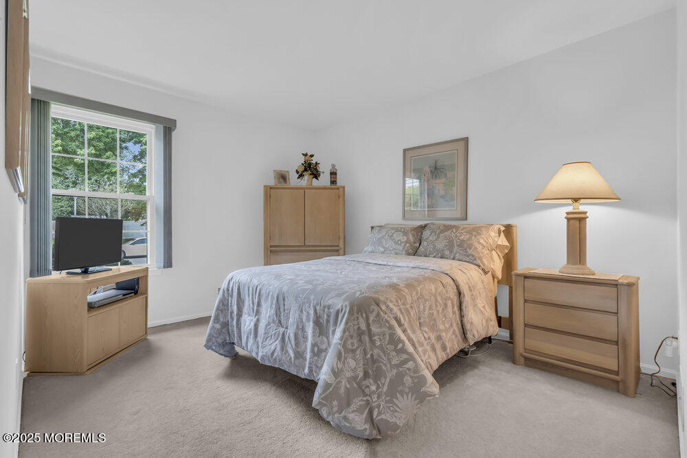 15 Rita Drive Howell, NJ 07731 - Photo 19 of 26 a bedroom with bed and window