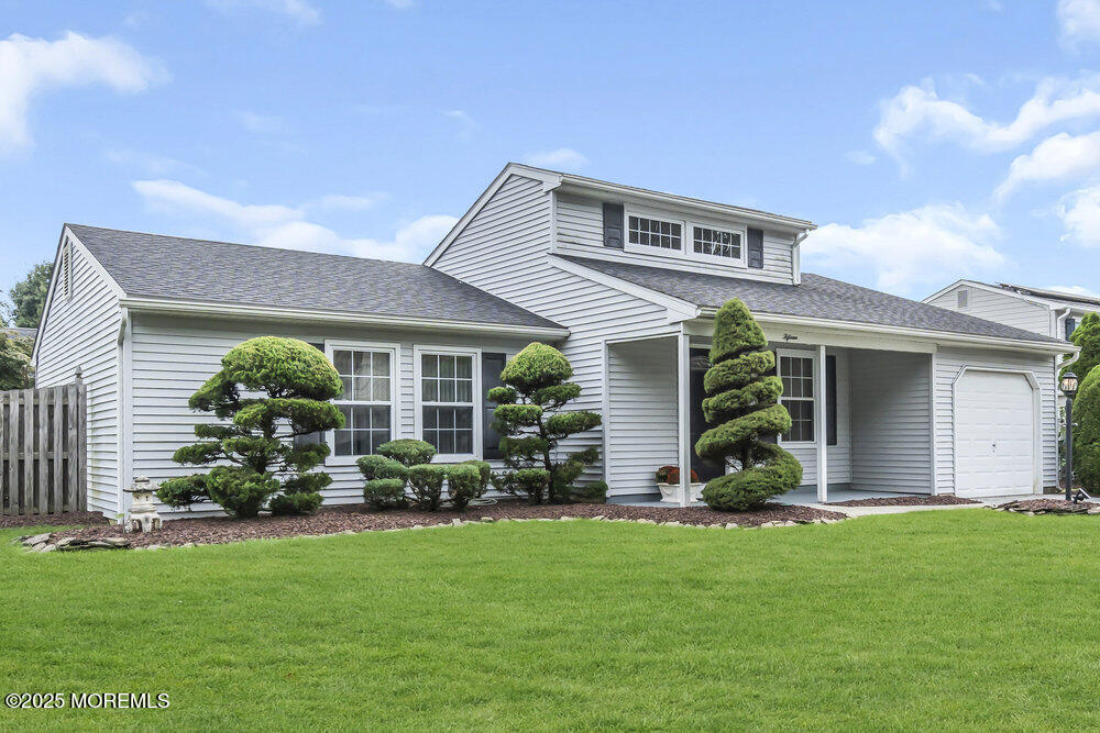 15 Rita Drive Howell, NJ 07731 - Photo 2 of 26 a front view of house with yard and green space