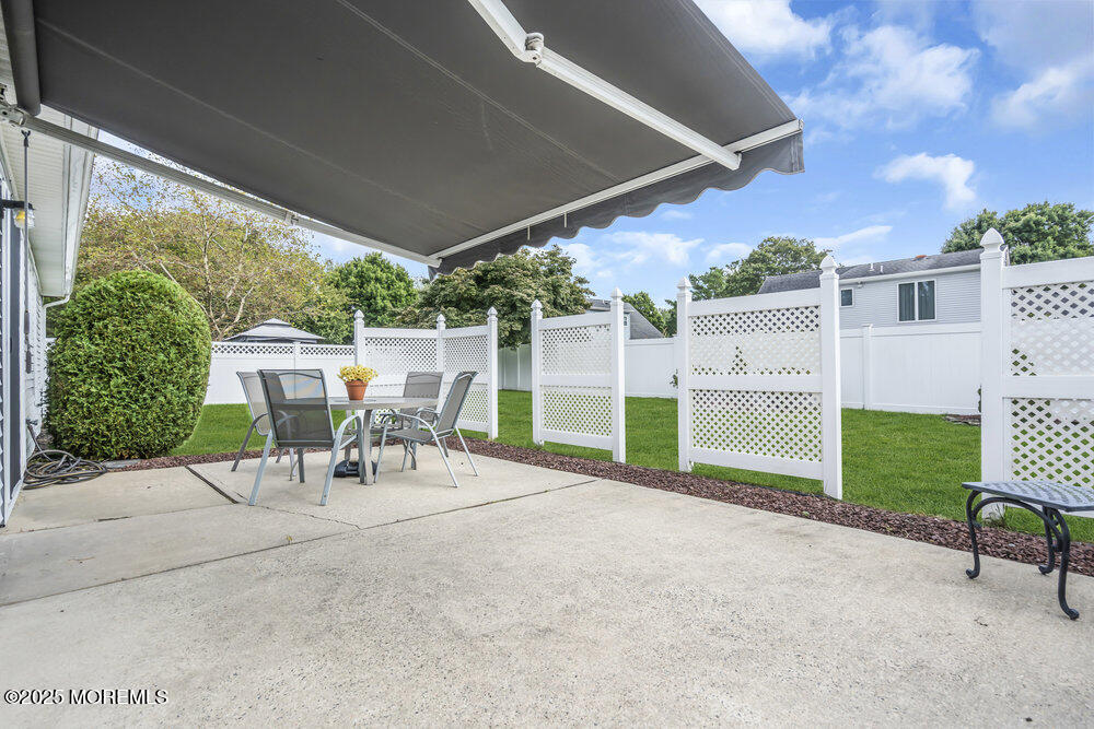 15 Rita Drive Howell, NJ 07731 - Photo 23 of 26 a view of a backyard with sitting area