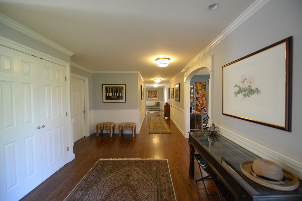 61 Dean Road Weston, MA 02493 - Photo 3 of 10 a view of a living room and dining room