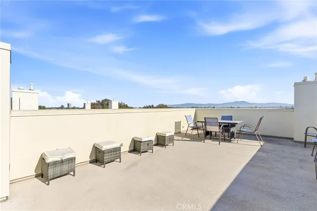 a view of a terrace with chairs