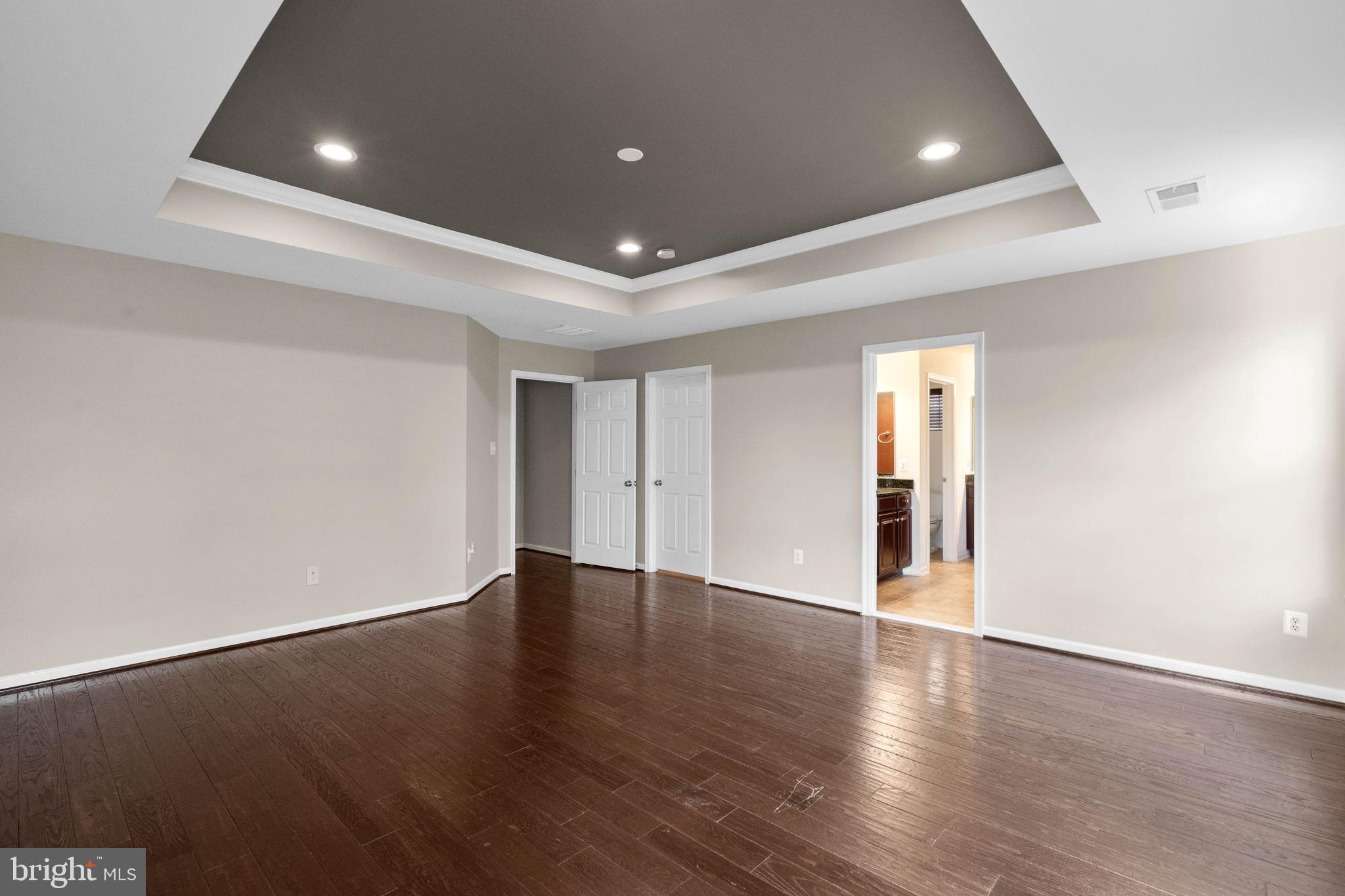 3614 Coatesly Drive Chantilly, VA 20151 - Photo 24 of 51 a view of an empty room with wooden floor and windows