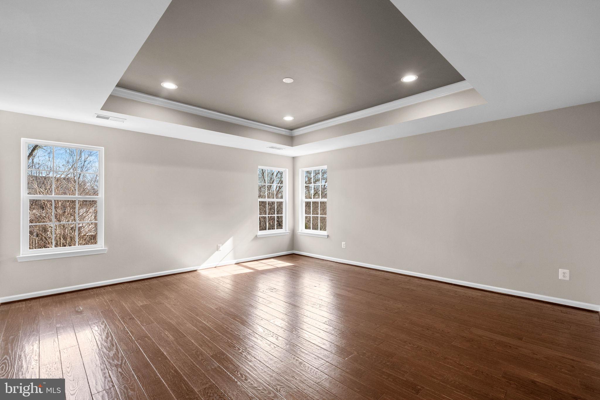 3614 Coatesly Drive Chantilly, VA 20151 - Photo 25 of 51 a view of an empty room with wooden floor and a window
