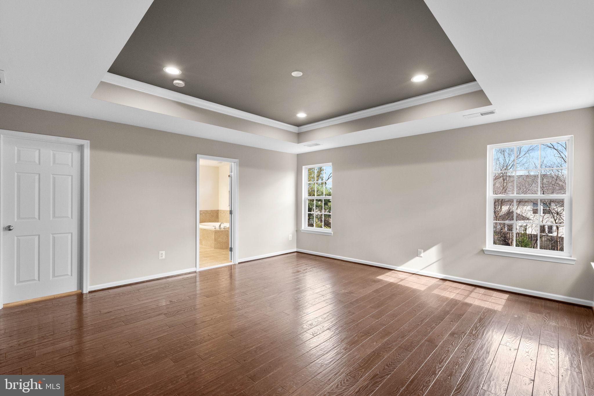 3614 Coatesly Drive Chantilly, VA 20151 - Photo 26 of 51 a view of an empty room with wooden floor and a window