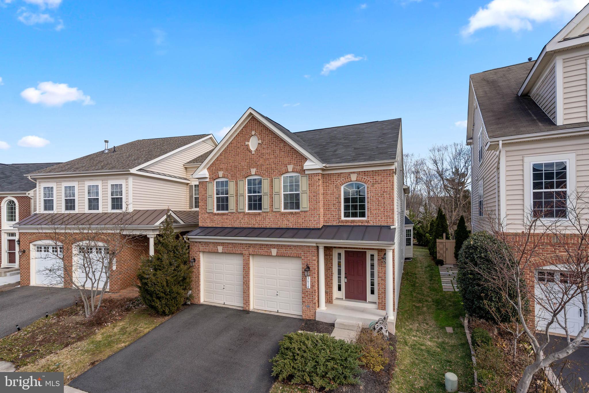 3614 Coatesly Drive Chantilly, VA 20151 - Photo 4 of 51 a front view of a house with garden