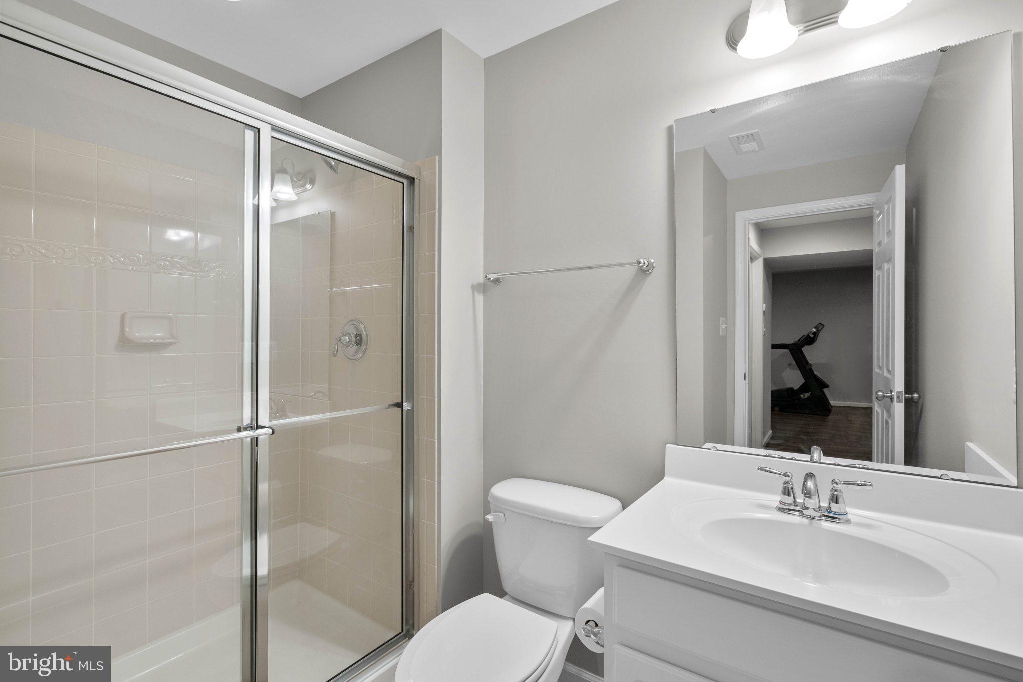 3614 Coatesly Drive Chantilly, VA 20151 - Photo 41 of 51 a bathroom with a toilet a sink and shower