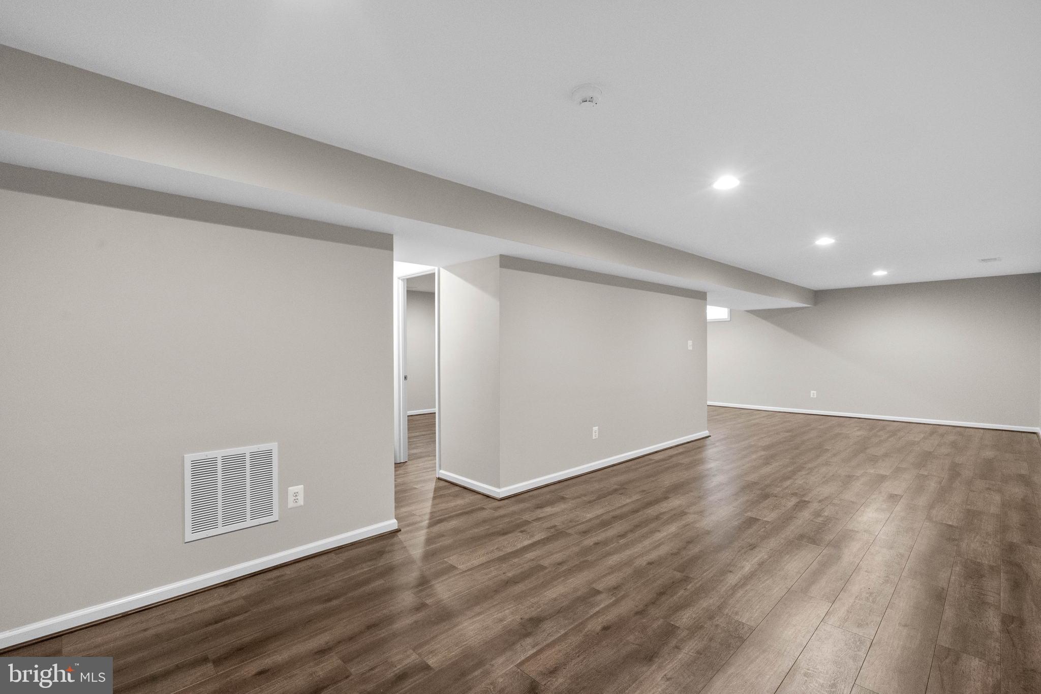 3614 Coatesly Drive Chantilly, VA 20151 - Photo 42 of 51 a view of an empty room with wooden floor