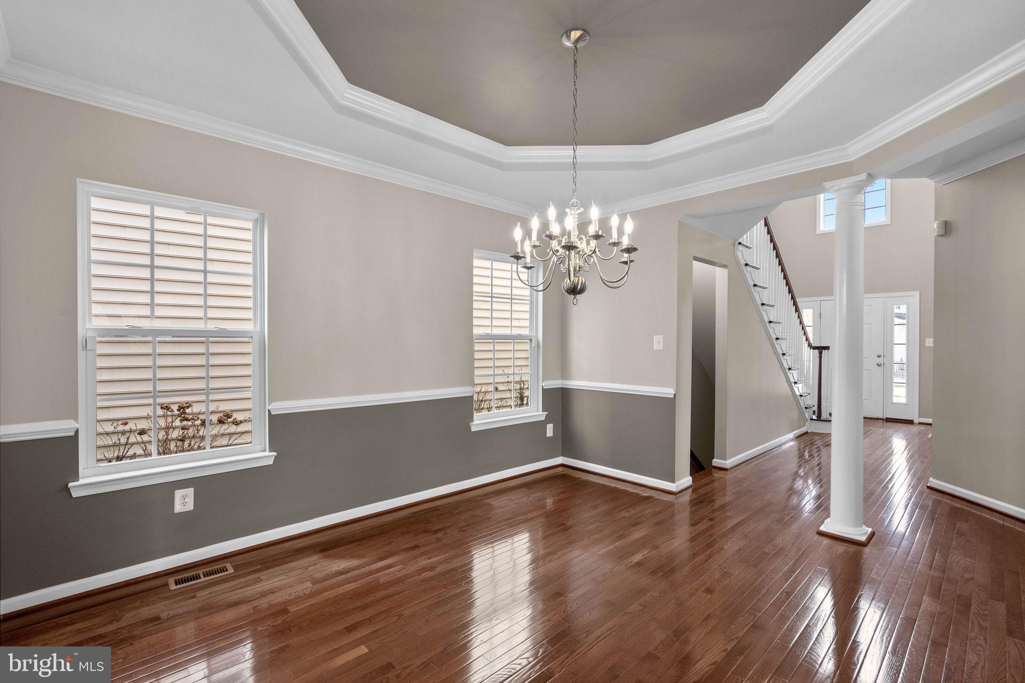 3614 Coatesly Drive Chantilly, VA 20151 - Photo 8 of 51 a view of an empty room with wooden floor and a window