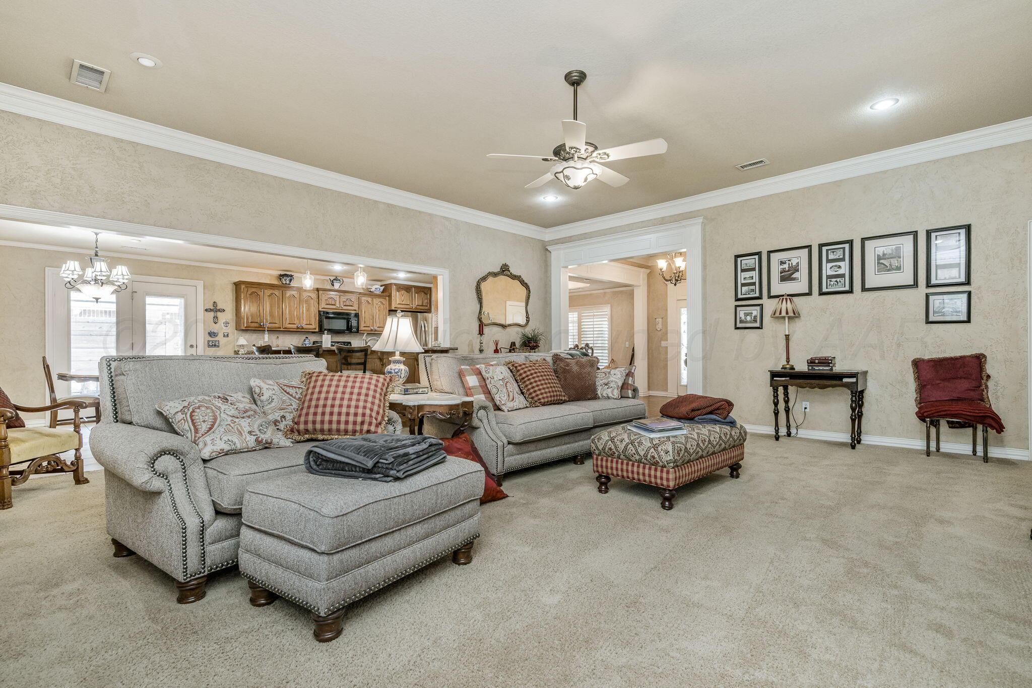 6007 Hunter Drive Amarillo, TX 79119 - Photo 6 of 28 a living room with furniture