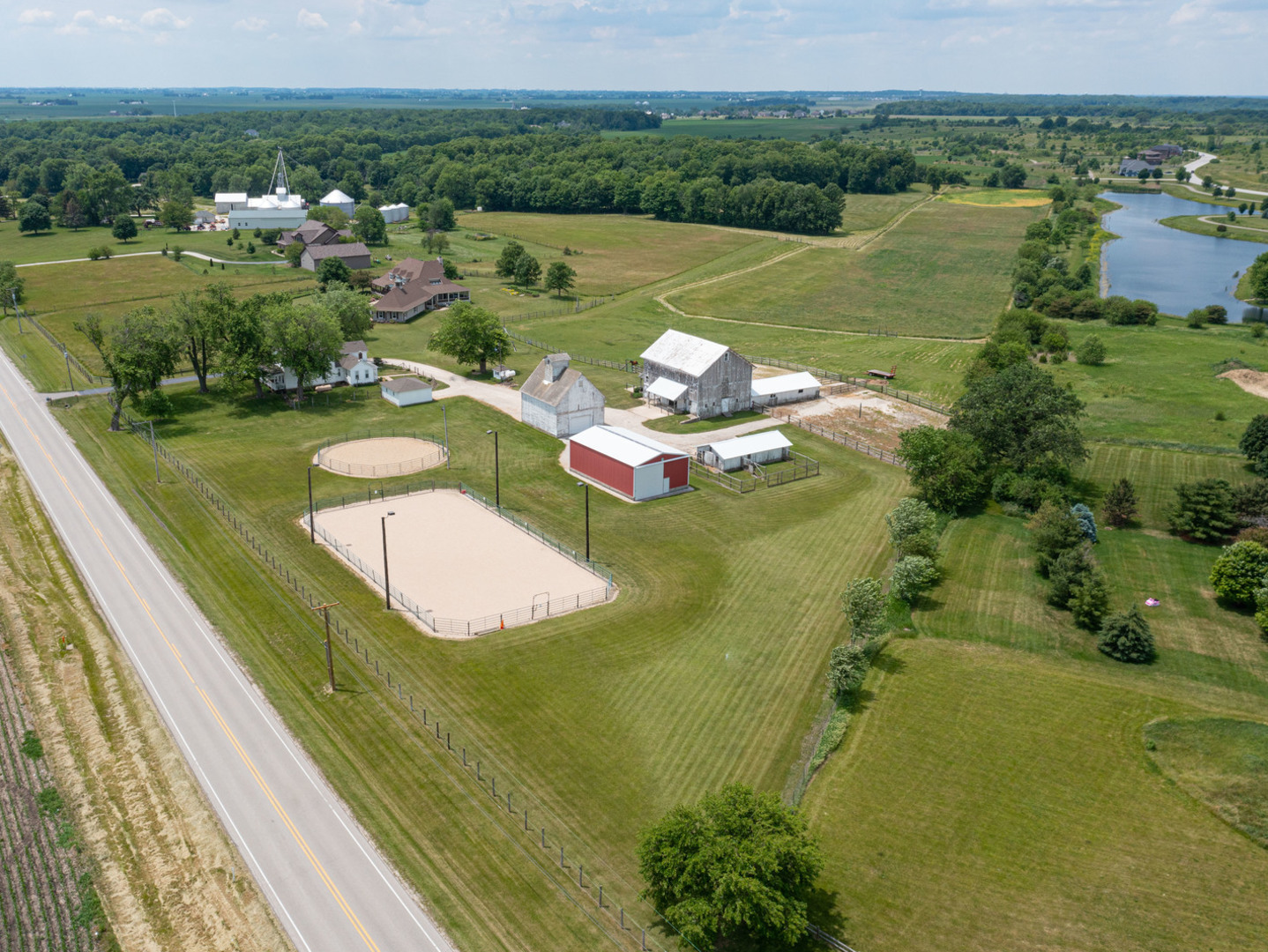 a view of a lake with a yard