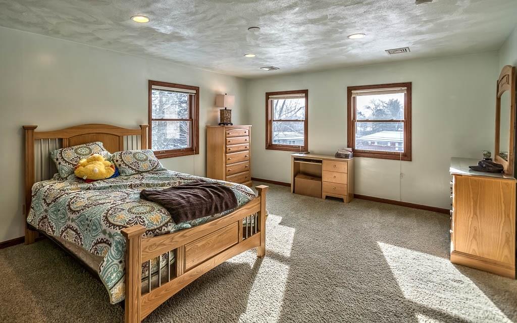 645 Field Club Road Pittsburgh, PA 15238 - Photo 18 of 25 The second bedroom is a large space bathed in natural light from its three windows.