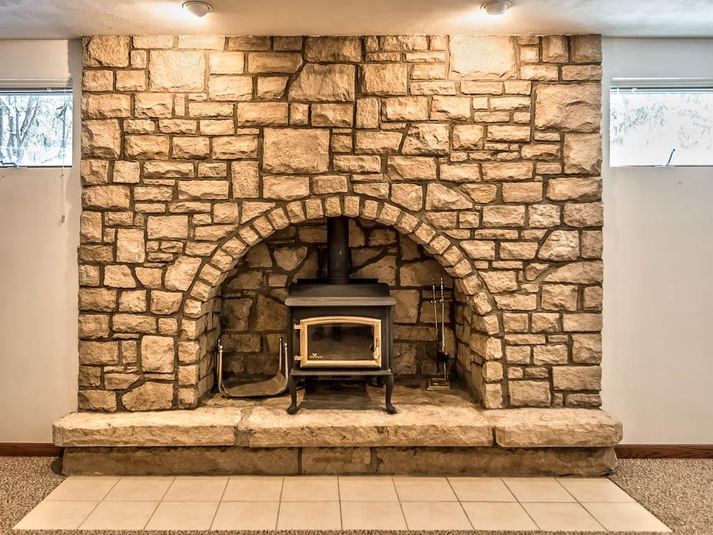 645 Field Club Road Pittsburgh, PA 15238 - Photo 23 of 25 The large fireplace in the lower level game room adds a warm ambiance.