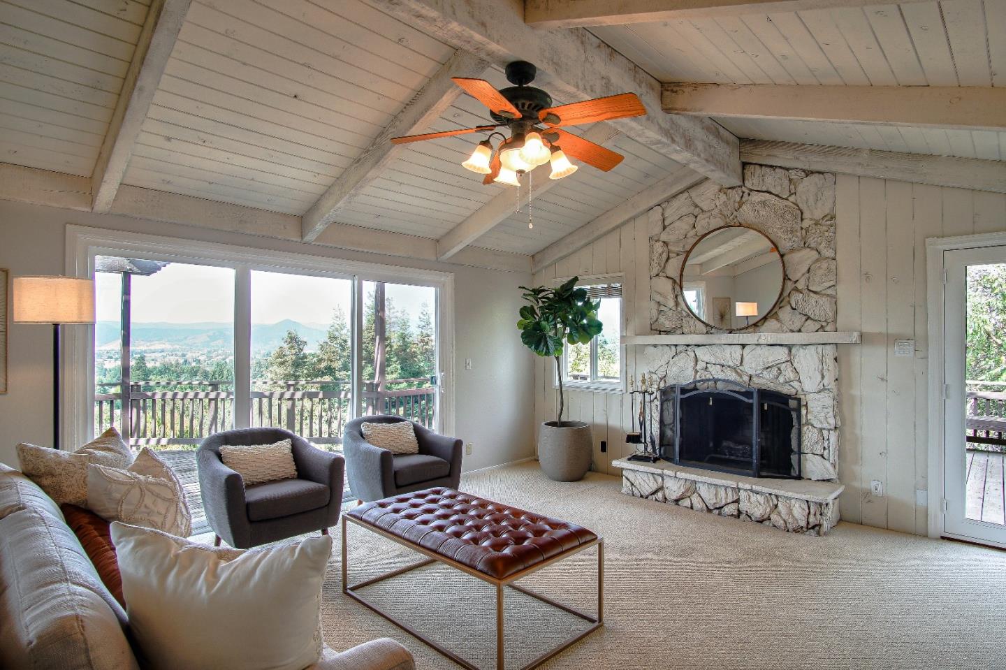 2740 Thomas Grde Morgan Hill, CA 95037 - Photo 16 of 67 a living room with furniture a fireplace and a floor to ceiling window