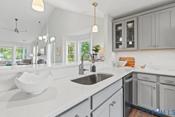a kitchen with sink and window