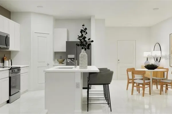 a view of kitchen with cabinets and wooden floor