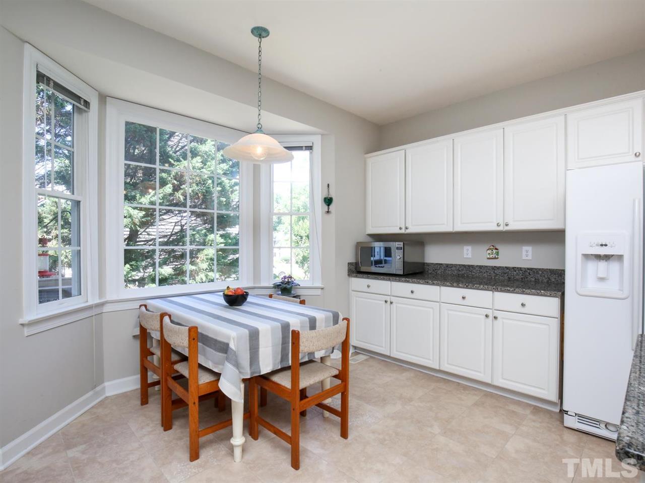 2329 Finley Ridge Lane Raleigh, NC 27615 - Photo 11 of 27 a dining room with furniture and window