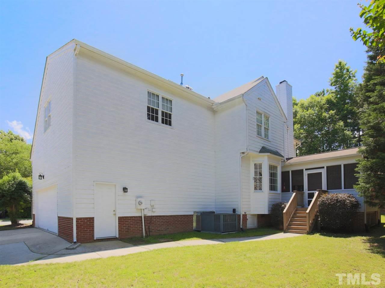 2329 Finley Ridge Lane Raleigh, NC 27615 - Photo 26 of 27 a front view of a house with a yard