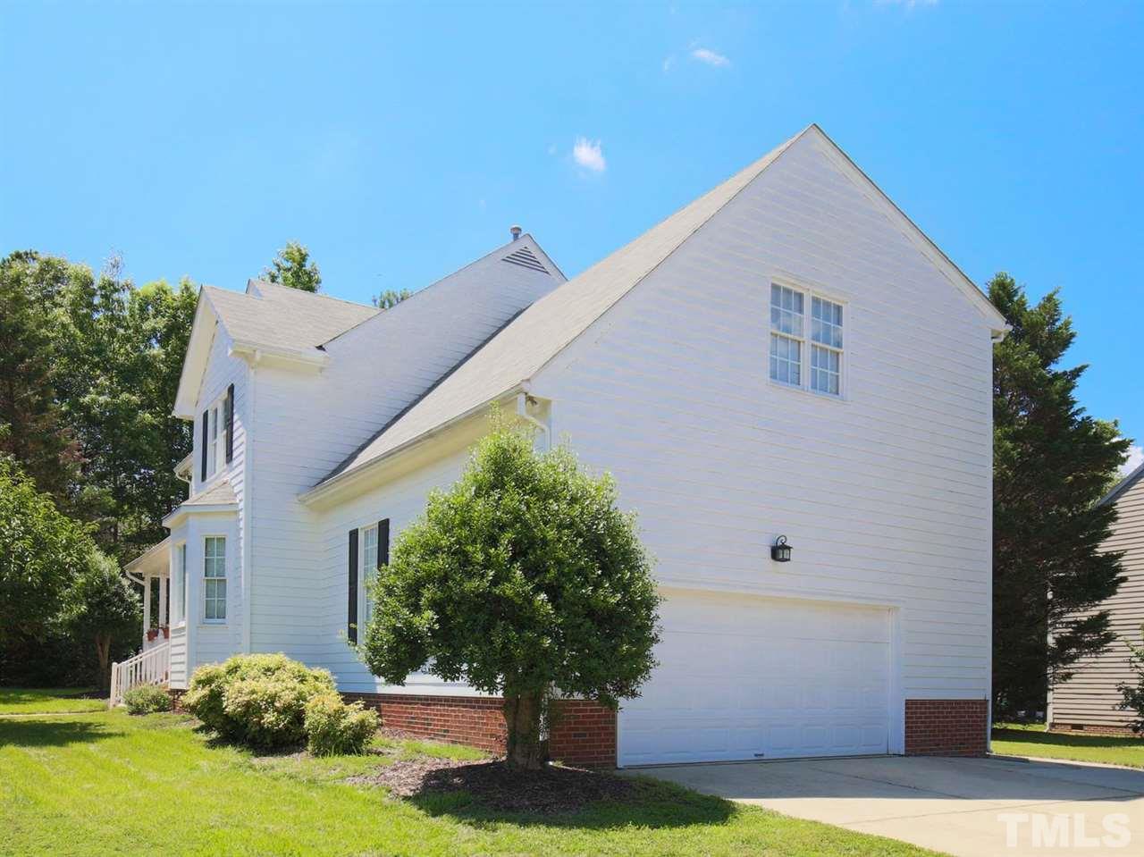 2329 Finley Ridge Lane Raleigh, NC 27615 - Photo 5 of 27 a front view of a house with garden
