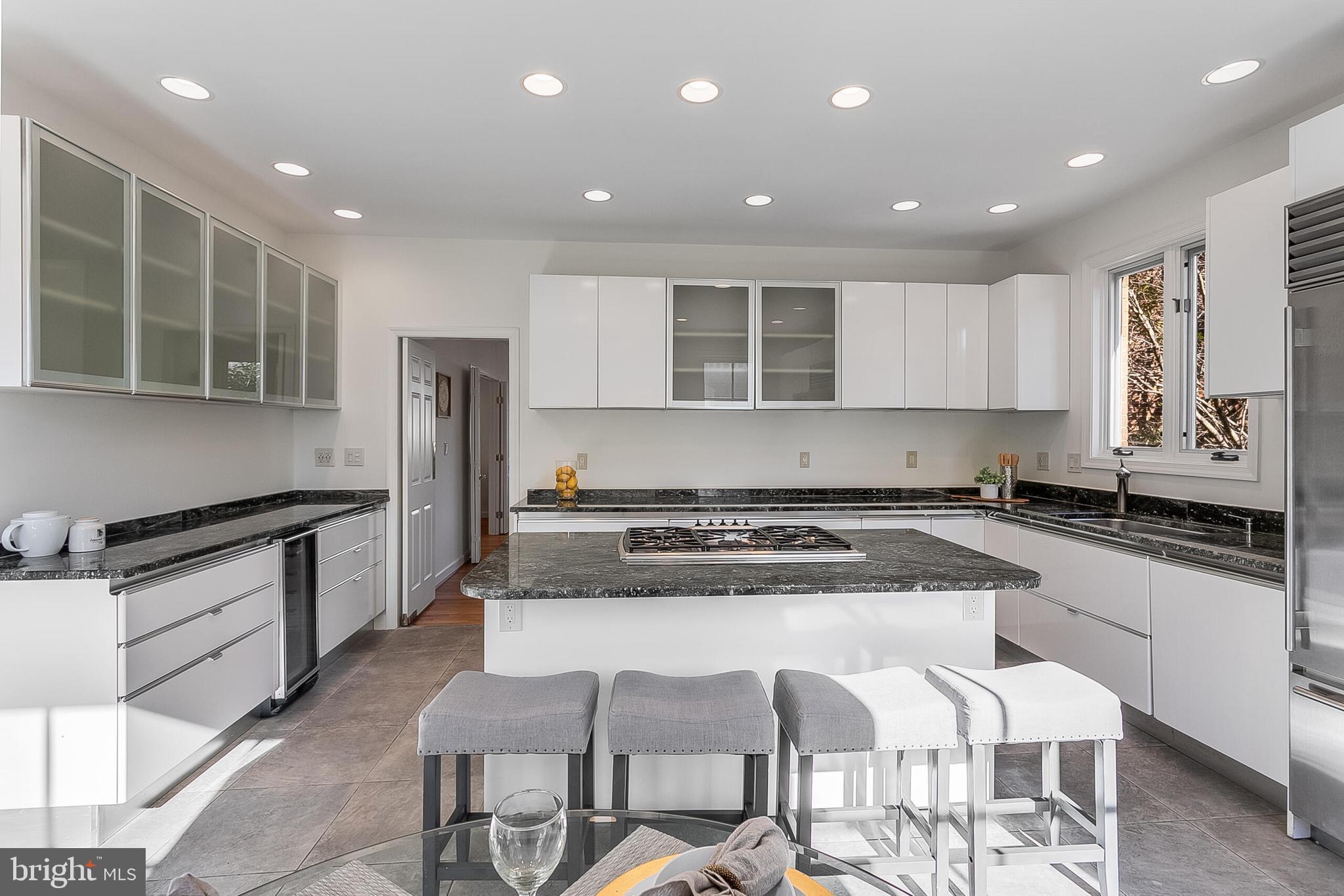 4709 Foxhall Crescent Northwest Washington, DC 20007 - Photo 11 of 57 Main level kitchen with island