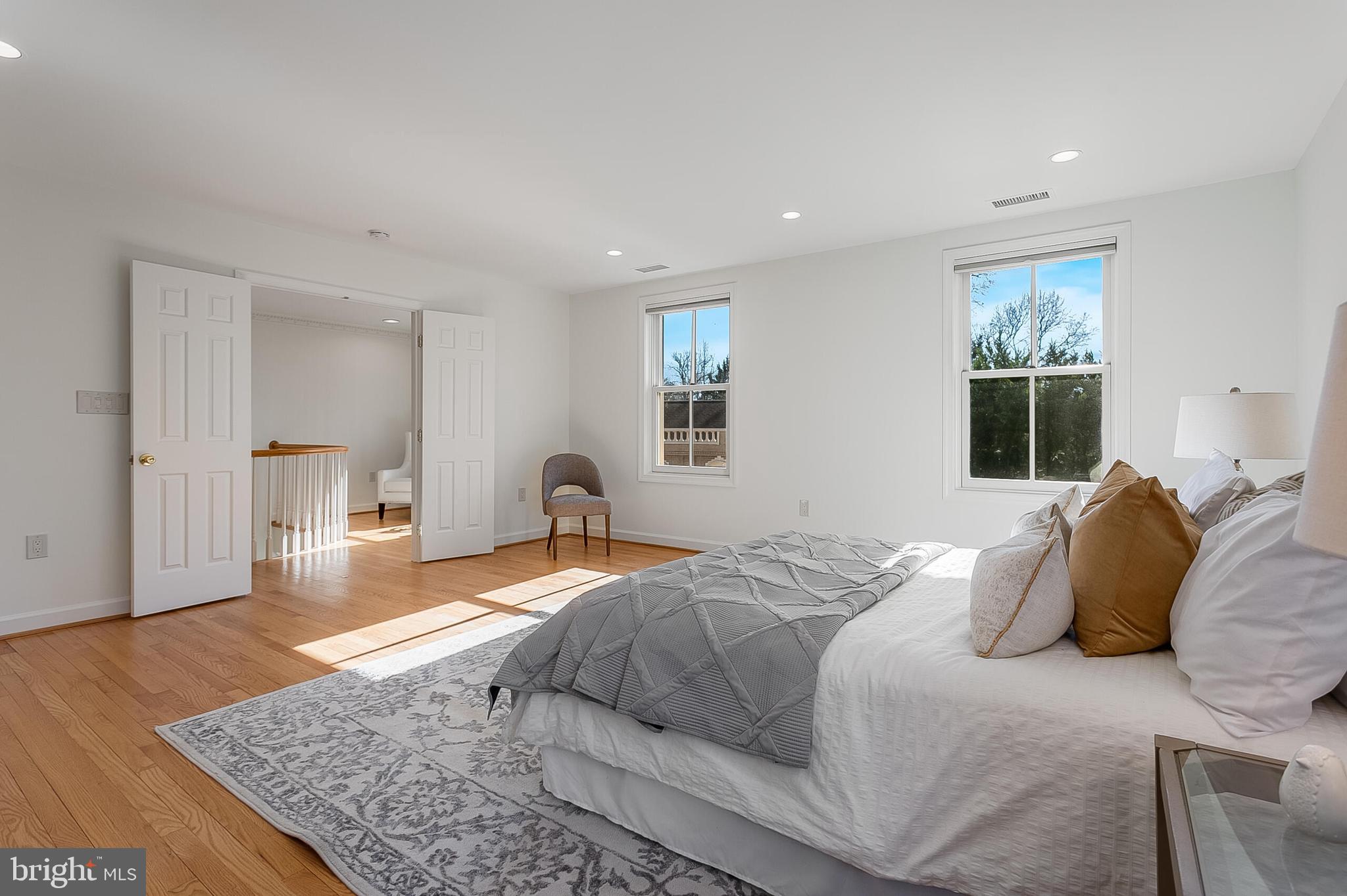 4709 Foxhall Crescent Northwest Washington, DC 20007 - Photo 28 of 57 Primary suite flooded in natural light