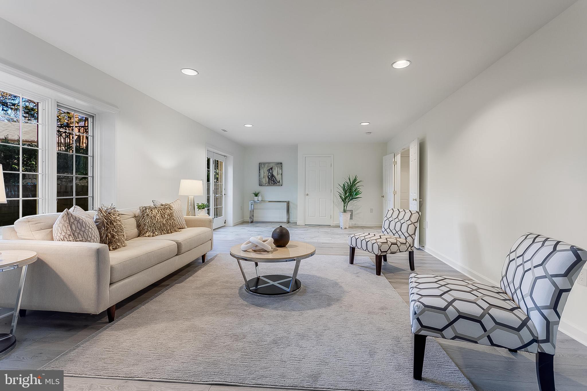 4709 Foxhall Crescent Northwest Washington, DC 20007 - Photo 35 of 57 Beautiful lower level rec room w/walkout