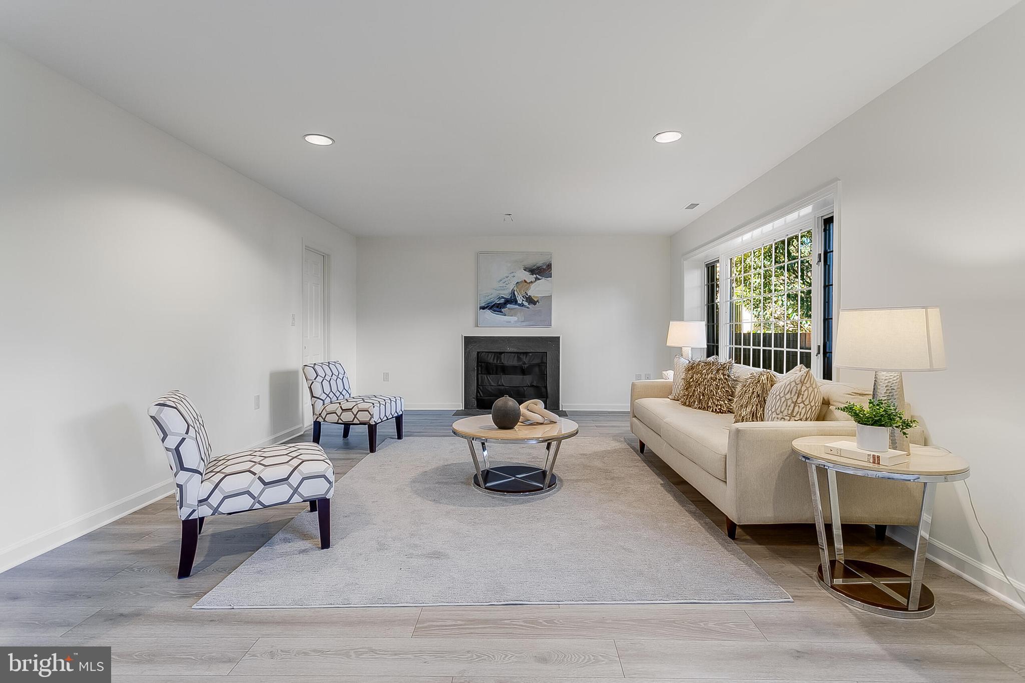 4709 Foxhall Crescent Northwest Washington, DC 20007 - Photo 36 of 57 Custom tile and new LVP flooring in rec room