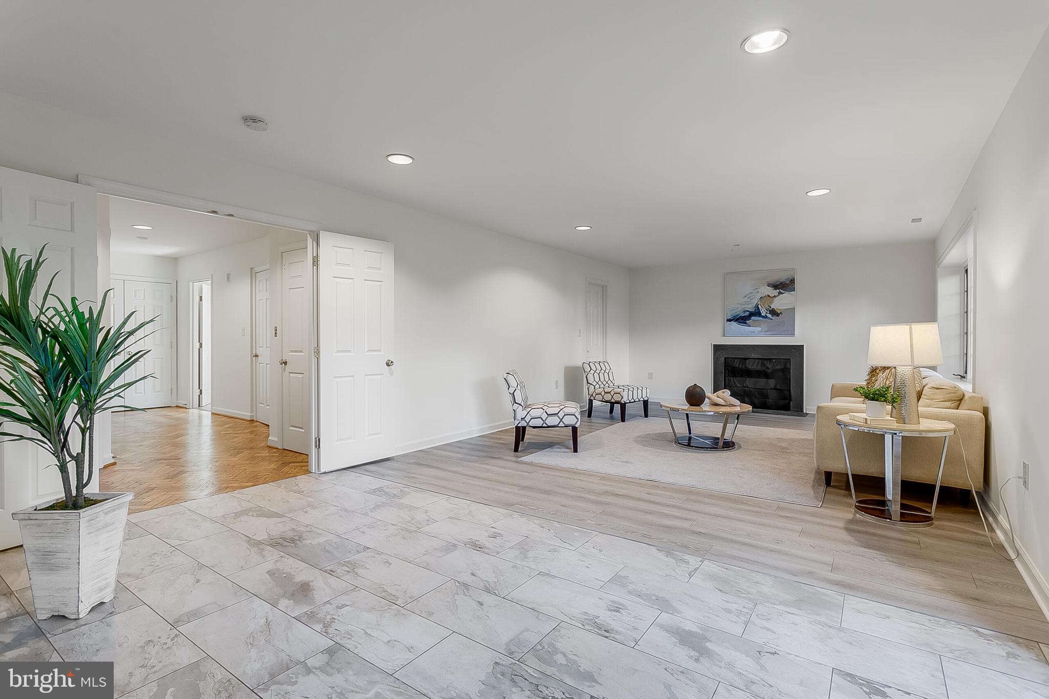 4709 Foxhall Crescent Northwest Washington, DC 20007 - Photo 38 of 57 Beautiful lower level rec room w/fireplace