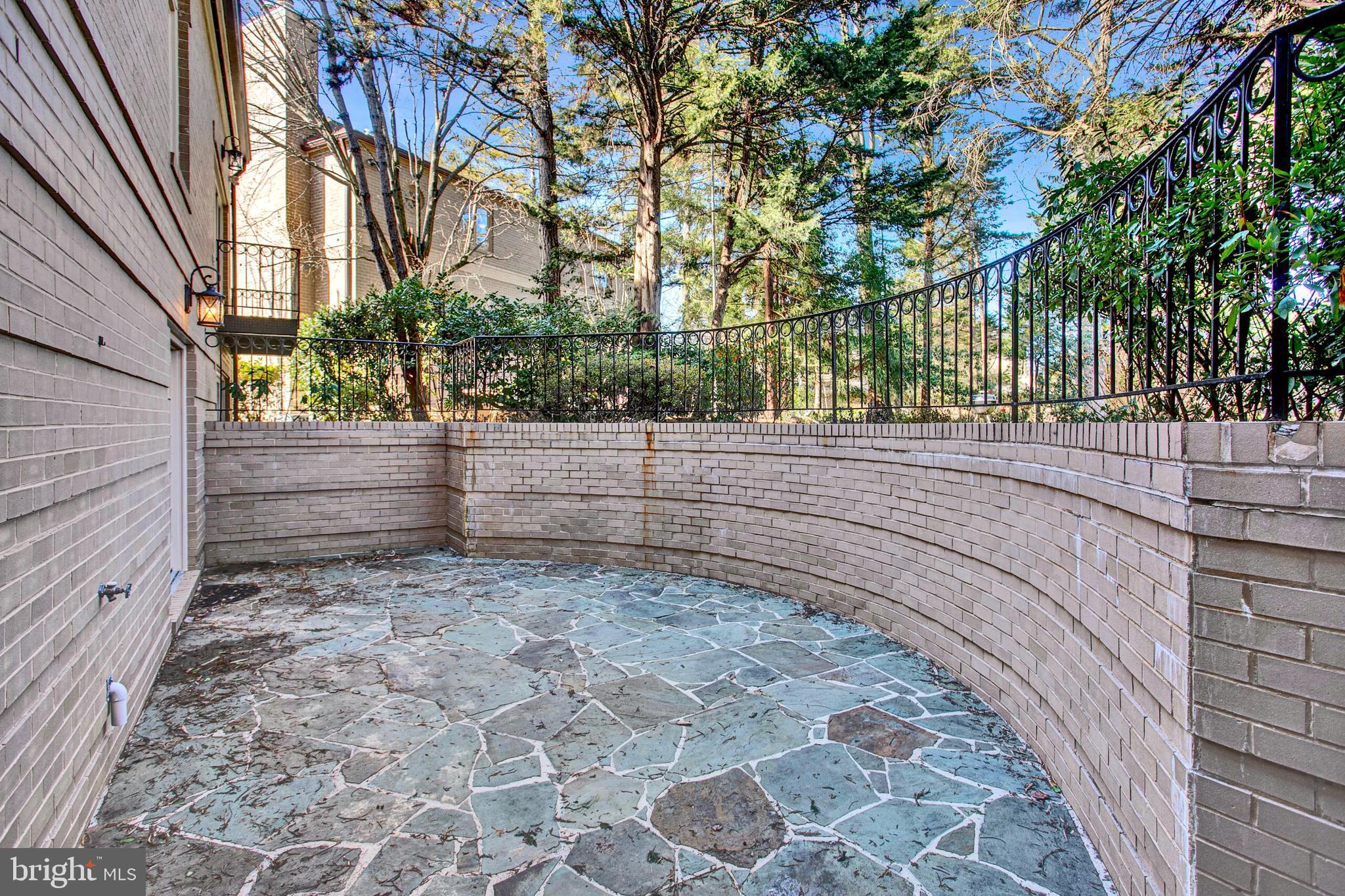 4709 Foxhall Crescent Northwest Washington, DC 20007 - Photo 50 of 57 Stone patio, perfect for outdoor dining