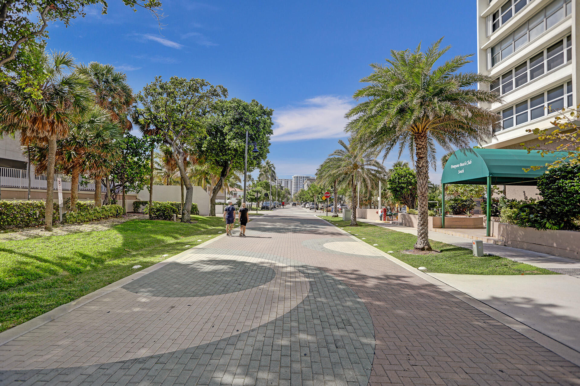 111 Briny Avenue, Unit 810 Pompano Beach, FL 33062 - Photo 40 of 62 a view of a yard with palm trees