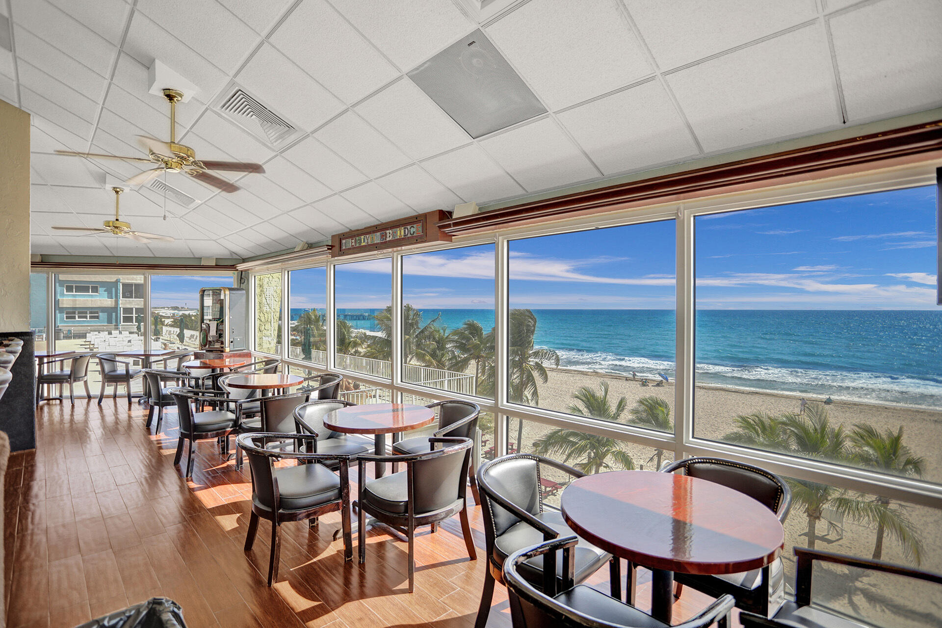 111 Briny Avenue, Unit 810 Pompano Beach, FL 33062 - Photo 50 of 62 a view of a dining room with furniture window and outside view