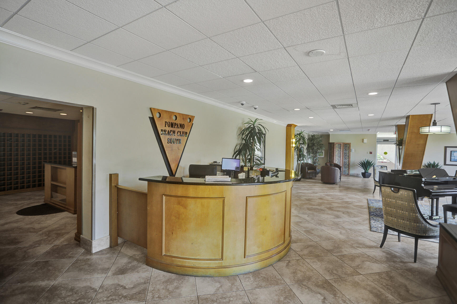 111 Briny Avenue, Unit 810 Pompano Beach, FL 33062 - Photo 55 of 62 a view of a dining room with furniture