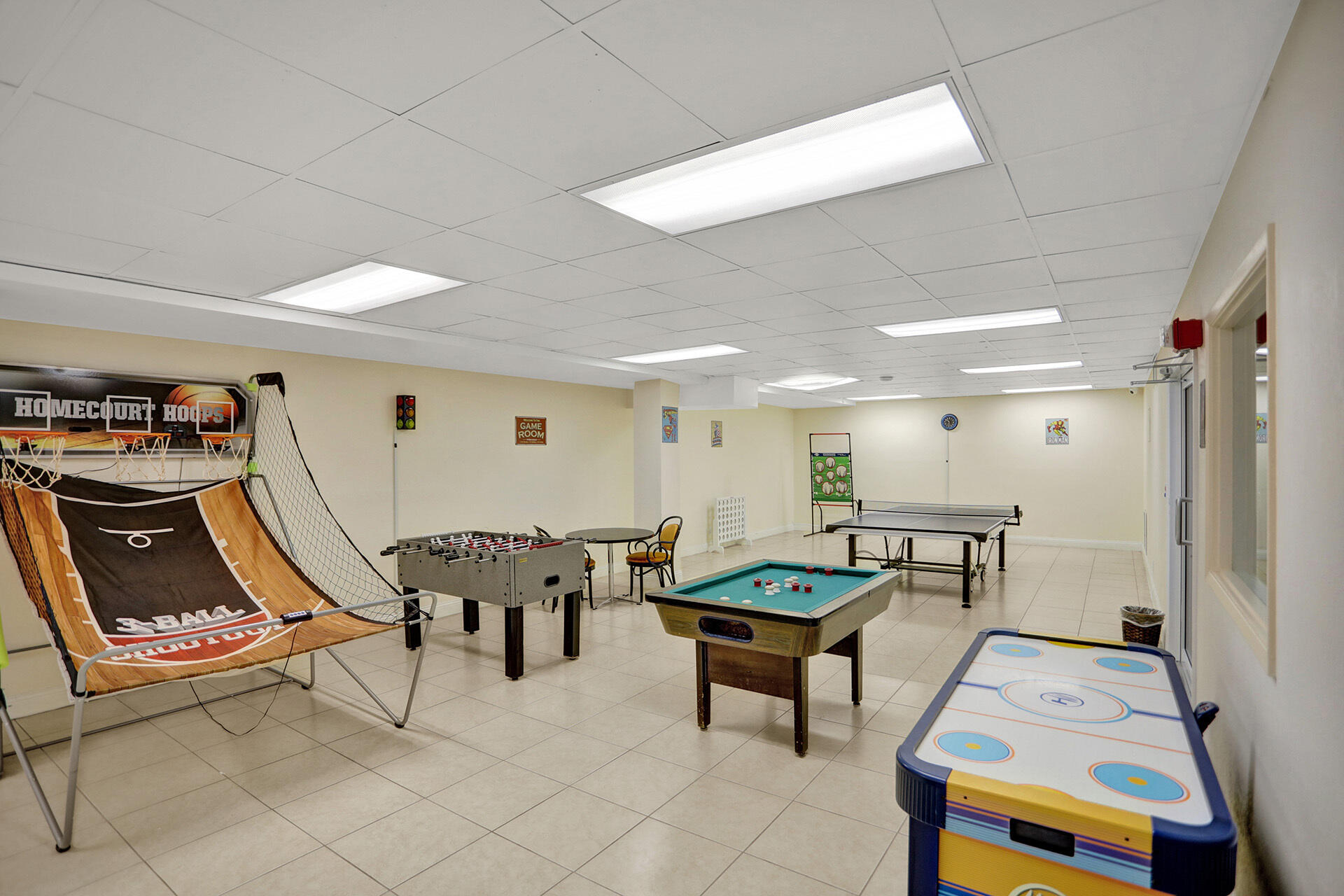 111 Briny Avenue, Unit 810 Pompano Beach, FL 33062 - Photo 56 of 62 a living room with furniture and wooden floor