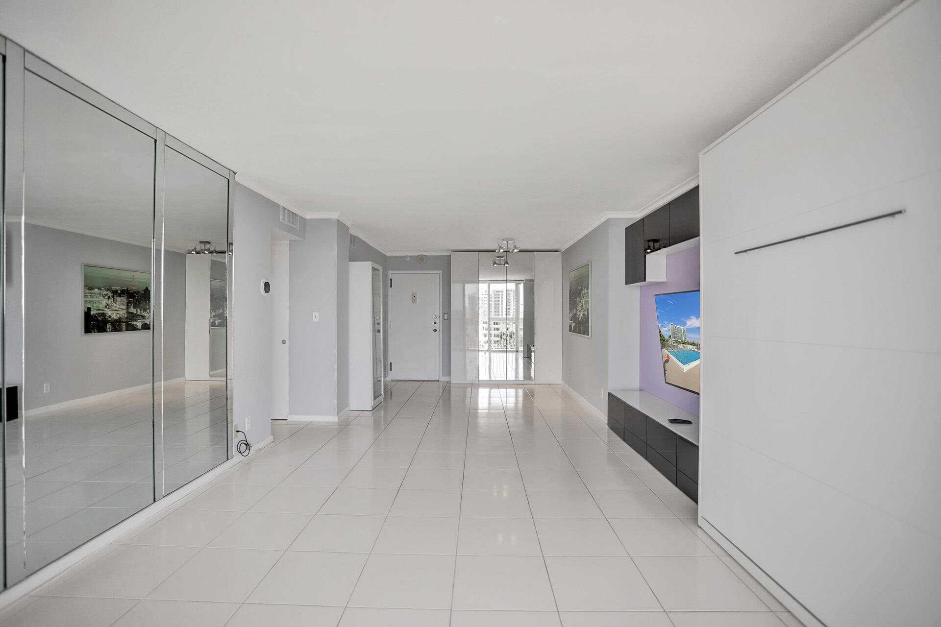 111 Briny Avenue, Unit 810 Pompano Beach, FL 33062 - Photo 9 of 62 a view of livingroom with hardwood