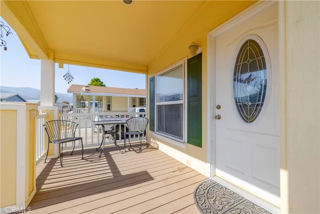 a view of a wooden deck with city view