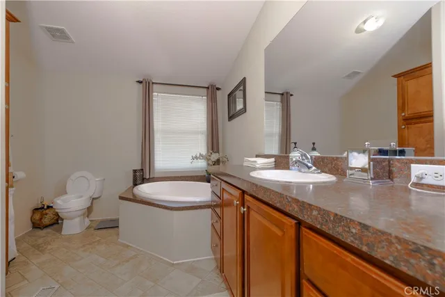 a bathroom with a sink and a toilet