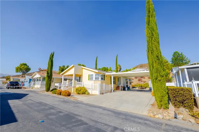 a front view of building with street