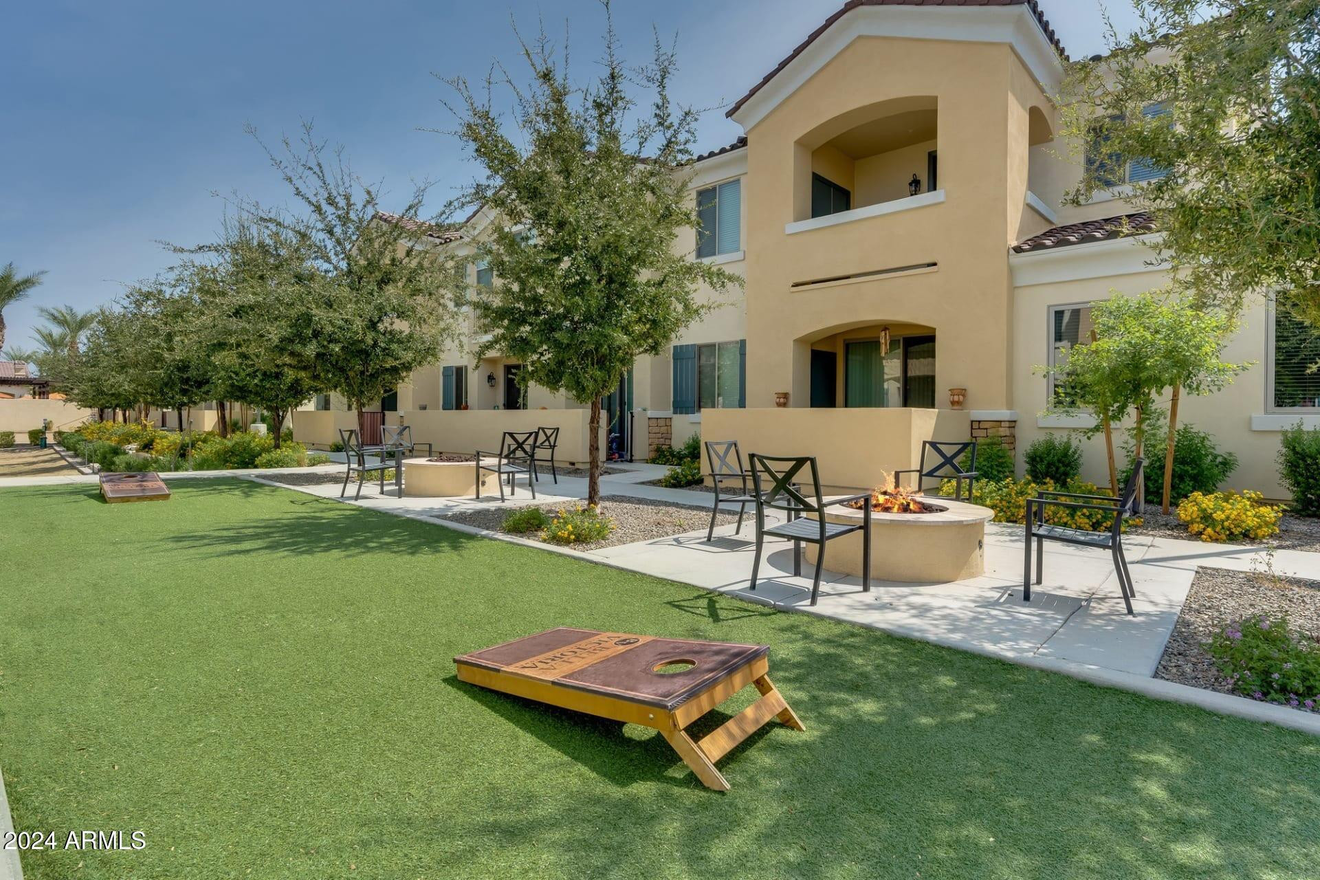 1350 South Ellsworth Road, Unit 3 Mesa, AZ 85209 - Photo 22 of 42 a view of a backyard with sitting area