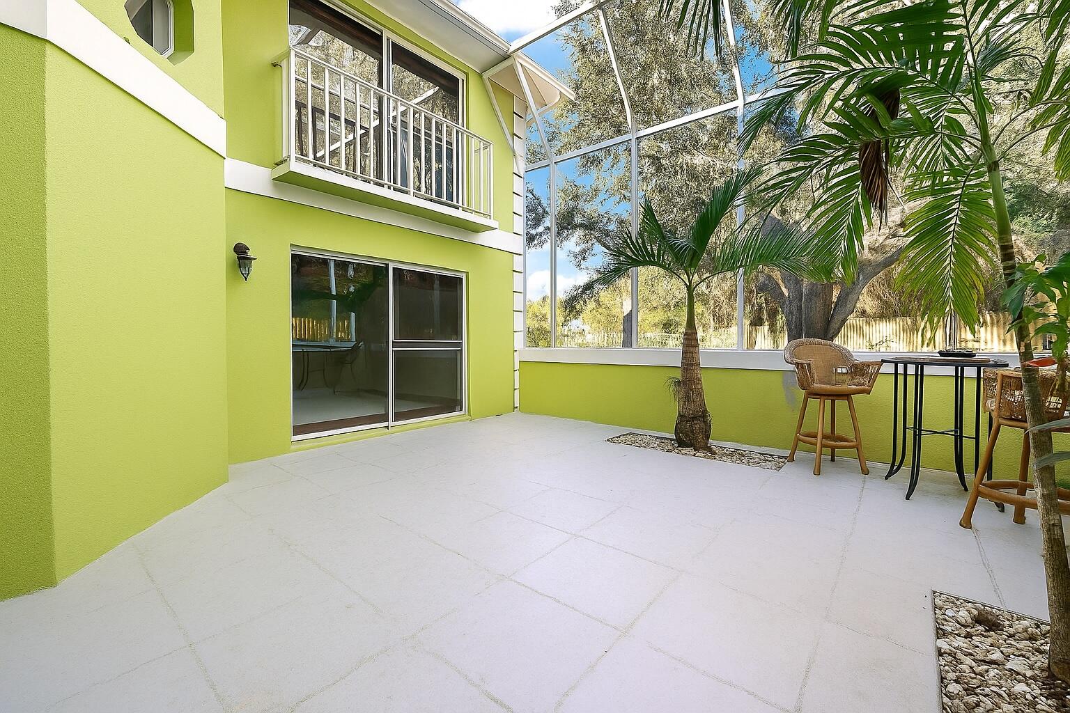 81 Southeast Beech Tree Lane Stuart, FL 34994 - Photo 4 of 27 a view of a building with a outdoor space