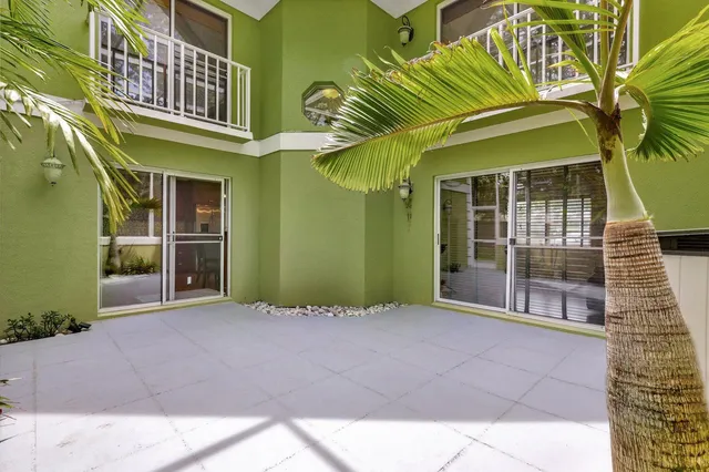 a view of a brick house with a windows