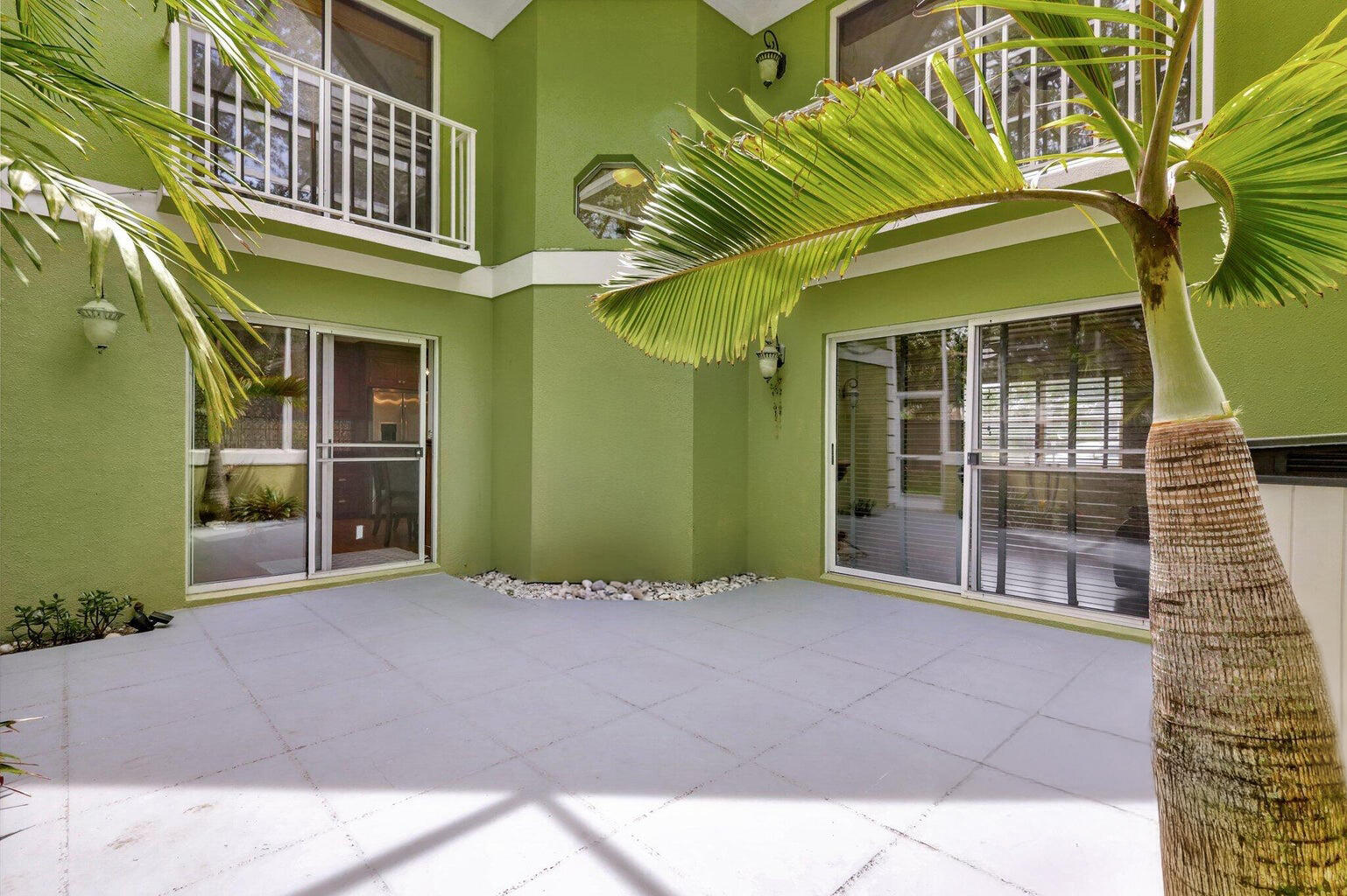 81 Southeast Beech Tree Lane Stuart, FL 34994 - Photo 5 of 27 a view of a brick house with a windows