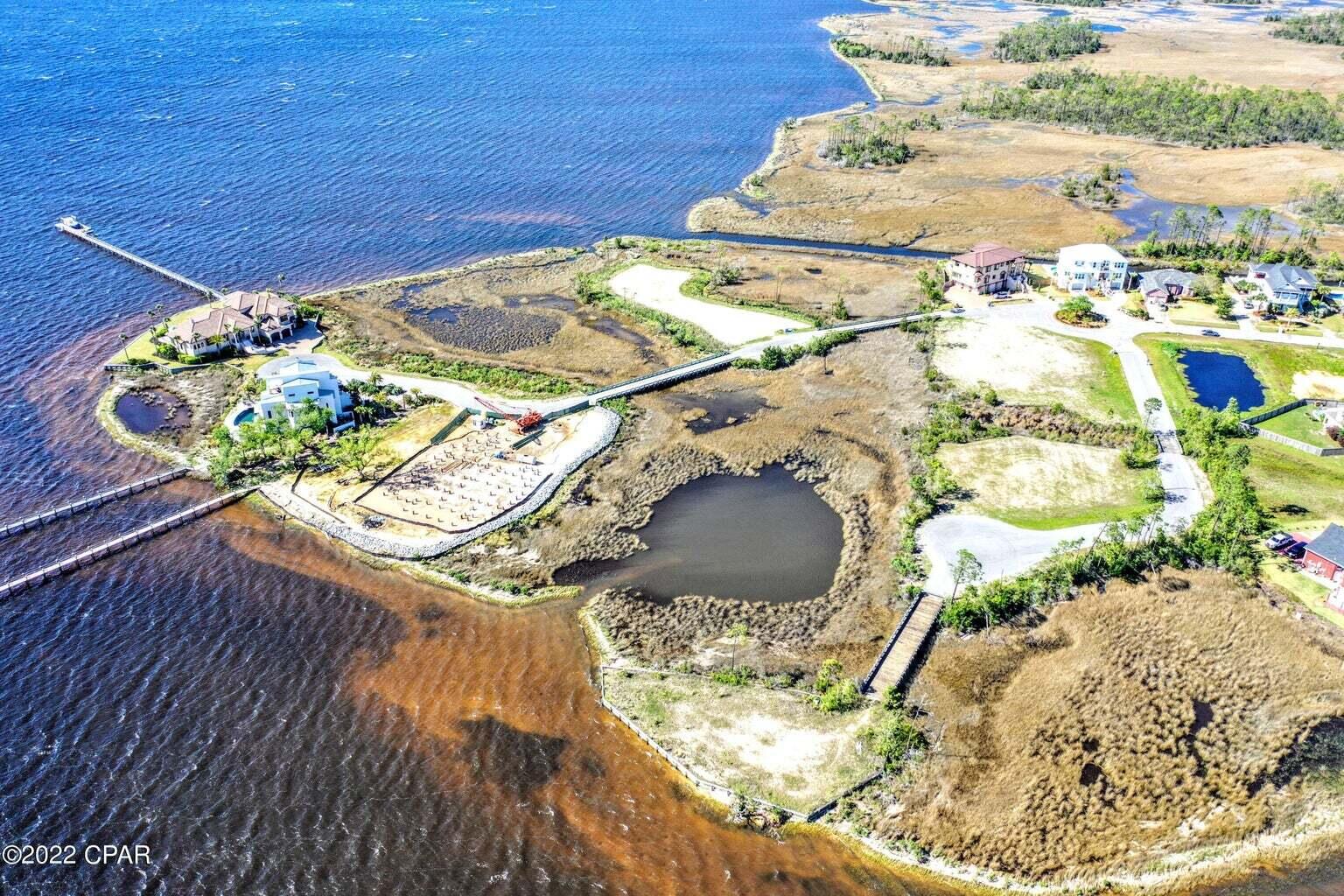 Lot 12 Northshore Islands Road Panama City, FL 32405 - Photo 6 of 12 a vase of flowers sitting on a table