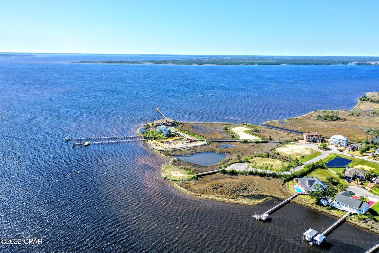 Lot 12 Northshore Islands Road Panama City, FL 32405 - Photo 7 of 12 a view of a ocean view with a table and a chairs