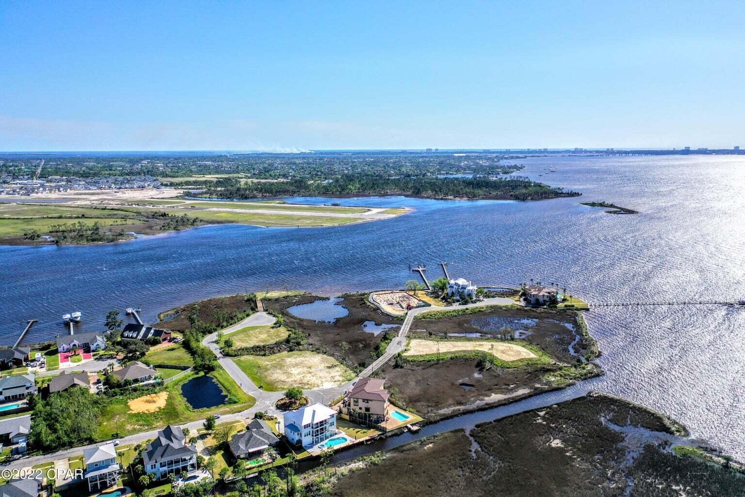 Lot 12 Northshore Islands Road Panama City, FL 32405 - Photo 10 of 12 an aerial view of a house with a ocean view