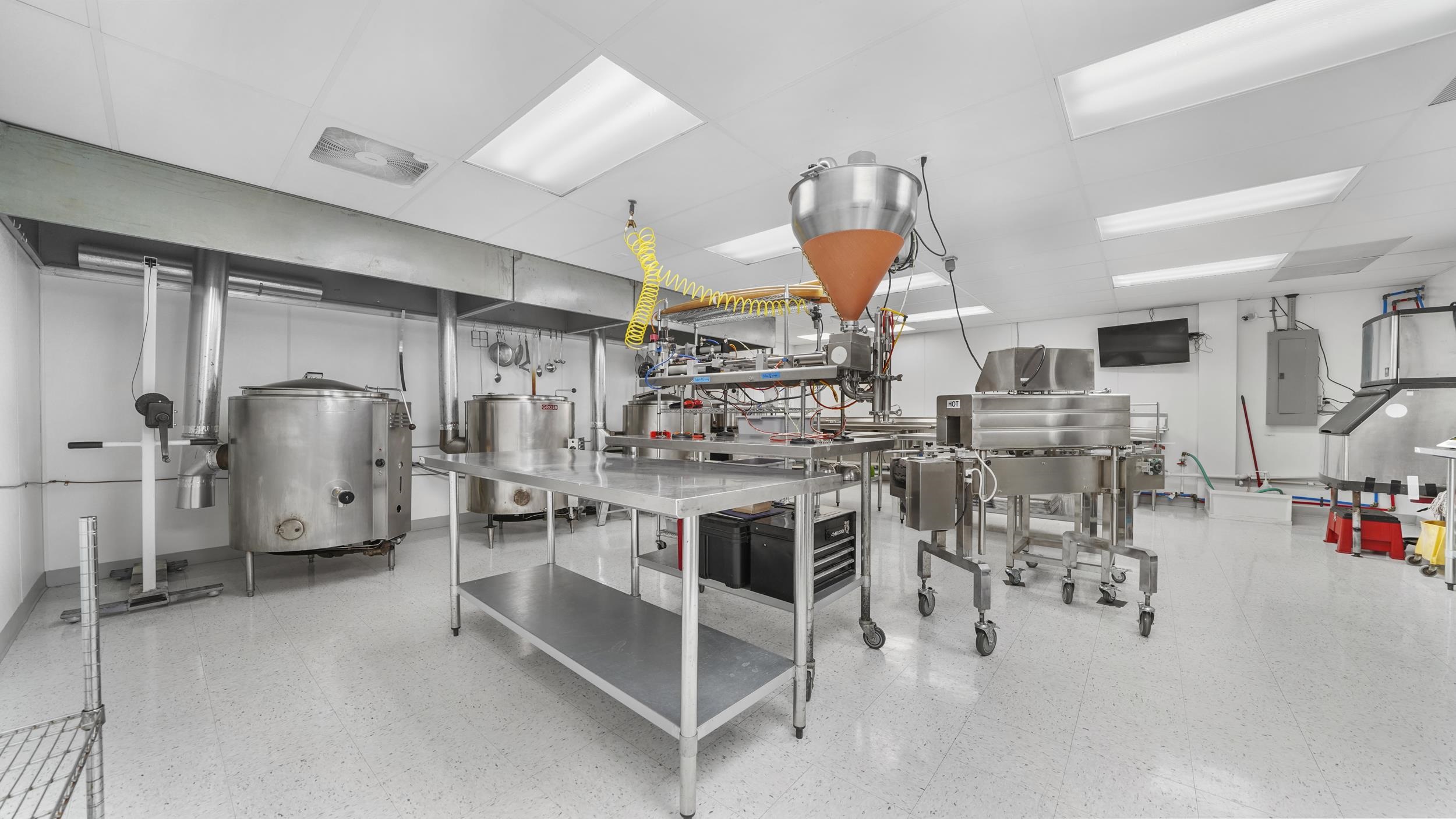 3376 C Road Palisade, CO 81526 - Photo 14 of 23 a room with lots of white furniture and appliances