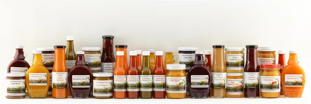 wooden floor with a table and chairs