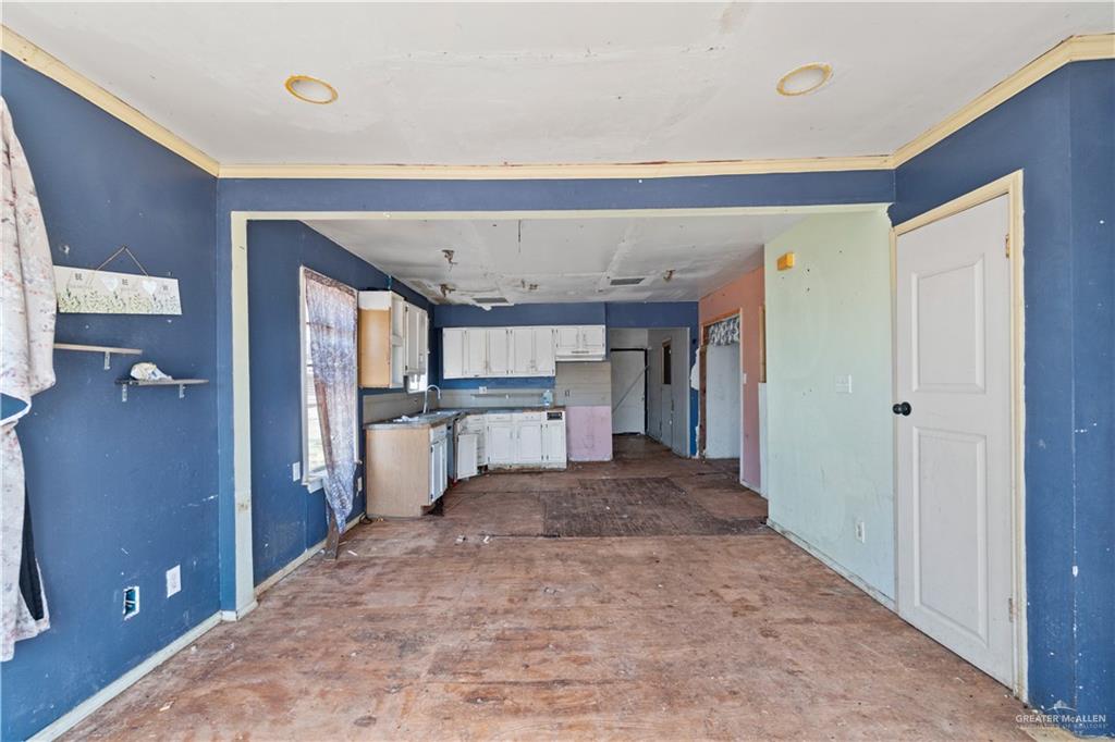 18301 Primera Road Harlingen, TX 78552 - Photo 11 of 15 a view of a hallway to a room